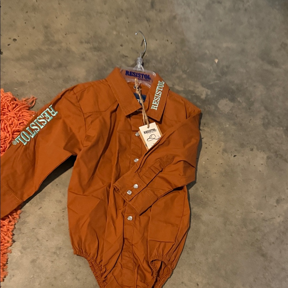 Resistol Burnt Orange Long Sleeve Onesie